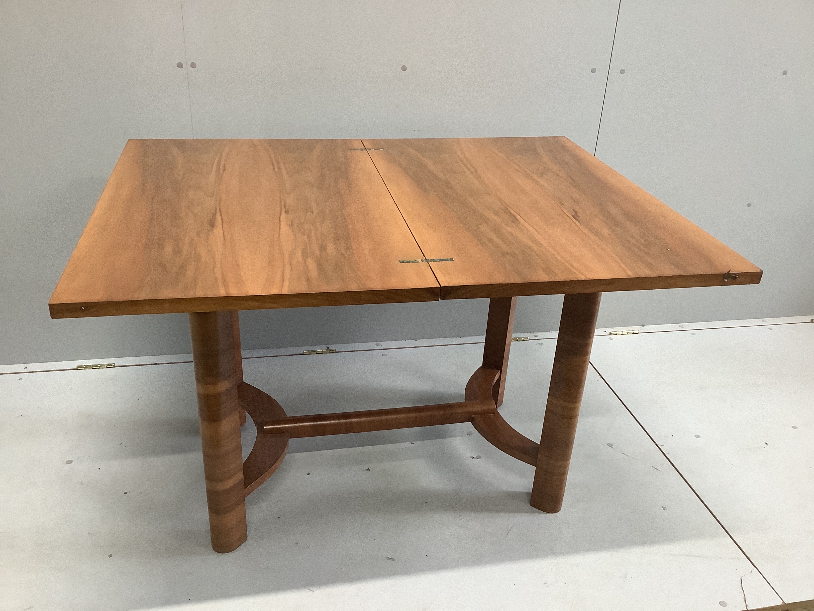 An Art Deco style rectangular walnut folding table, width 92cm, depth 59cm, height 76cm